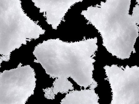 White Snow Isolated on Pure Black Background                               の写真素材
