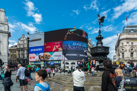London, United Kingdom - July 11, 2016: Tourists visiting London, in front of Piccadilly Circusのeditorial素材
