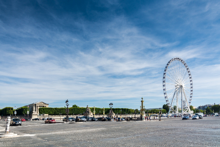 Paris, France - August 13, 2016: The ferris wheel on the Place de la Concorde is one of the major public squares in Paris, France. It is located in the city's eighth arrondissement, at the eastern end of the Champs-Elysees.のeditorial素材