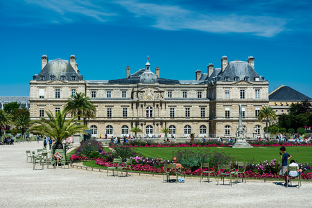 Paris, France - August 14, 2016: The Luxembourg garden covers 23 hectares and is known for the Luxembourg palace, its lawns, tree-lined promenades, flowerbeds, the model sailboats on its circular basin, and for the picturesque Medici Fountainのeditorial素材