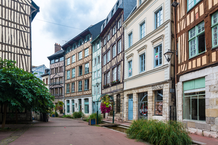 Rouen, France - September 4, 2016: The street Eau de Robec in Rouen, with its waterway and its little bridges. Rouen, France - September 4, 2016: The street Eau de Robec in Rouen, with its waterway and its little bridges.
