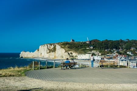 Etretat, France - September 8, 2016: Etretat is best known for its chalk cliffs, including three natural arches and a pointed formation called L'Aiguille or the Needle, which rises 70 metres above the sea.のeditorial素材