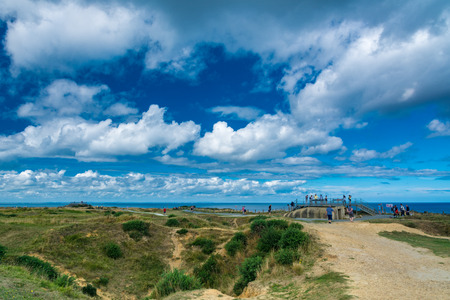 Pointe du Hoc, France - September 9, 2016: During World War II, The Pointe du Hoc was the highest point between Utah Beach and Omaha Beach. The German army fortified the area with concrete casemates and gun pits. On D-Day the US Army assaulted and captureのeditorial素材