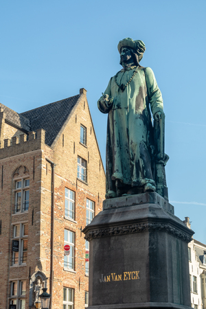 Statue of the Flemish painter Jan van Eyck in Bruges, Belgiumのeditorial素材