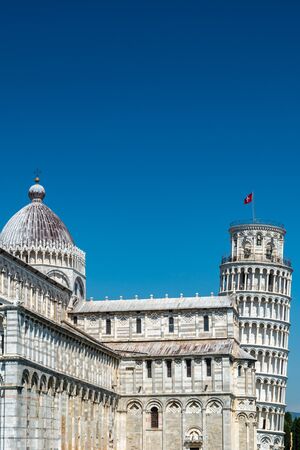 Pisa, Italy - June 6, 2019 : The Leaning Tower of Pisa is the campanile, or freestanding bell tower, of the cathedral of the Italian city of Pisa, known worldwide for its nearly four-degree lean. The tower is situated behind the Pisa Cathedral.の写真素材