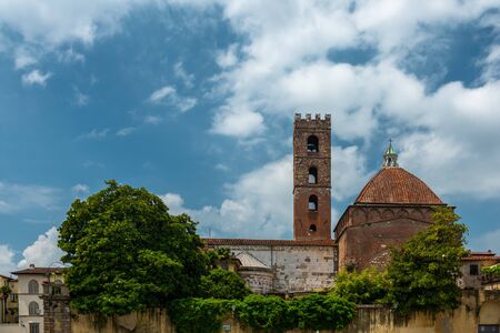 Lucca, Italy - June 6, 2019 : The church of Saints Giovanni and Reparata is located in the Romanesque part of the historical centre of Lucca. The present appearance is the result of the reconstruction of the twelfth century.の写真素材