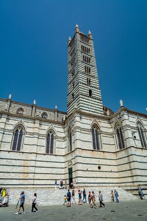 Siena, Italy - June 7, 2019 : Siena Cathedral (Duomo di Siena) is a medieval church dedicated from its earliest days as a Roman Catholic Marian church, and now dedicated to the Assumption of Mary.のeditorial素材