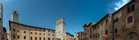 San Gimignano, Italy - June 7, 2019 : San Gimignano is a small walled medieval hill town. It is famous for its medieval architecture, unique in the preservation of about a dozen of its tower houses.のeditorial素材