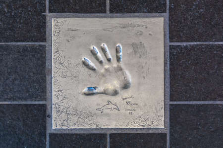 Cannes, France - June 12, 2019 : Handprints of celebrities. The imprint of the hand of Luc Besson.