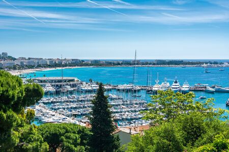 Cannes is located on the French Riviera and is known for its association with the rich and famous, luxury hotels and restaurants and the annual Cannes Film Festival.の写真素材