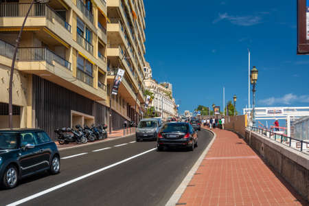 Monte Carlo, Monaco - June 13, 2019 : Monte Carlo street curve with formula one red and white signs in a sunny summer day in Monte Carlo, Monacoのeditorial素材
