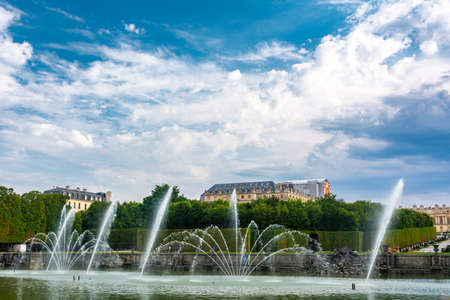Versailles, France - August 27, 2019: Neptune Fountain in gardens of famous Versailles palace. Palace of Versailles was a royal chateau and was added to UNESCO list of World Heritage Sites.のeditorial素材
