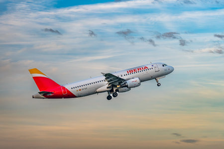 Brussels, Belgium - Dec 21, 2025: Iberia Airbus A320 narrow body passenger jet departing from...