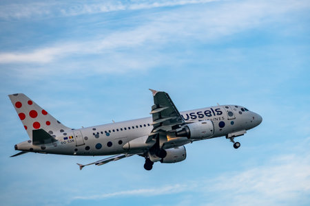Brussels, Belgium - Dec 21, 2025: Brussels Airlines Airbus A319 in iconic dot livery taking off from...