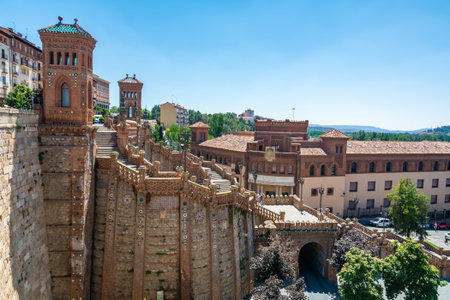 Teruel, Spain - August 15, 2022: Elevated view of the Escalinata del Ovalo and surrounding Mudejar-style buildings under a clear summer sky.のeditorial素材