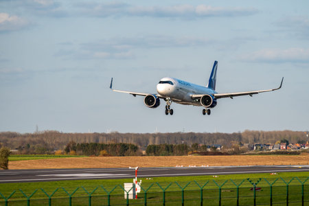 Brussels, Belgium - March 15, 2026: Aegean Airlines Airbus A320neo on final approach to Brussels...