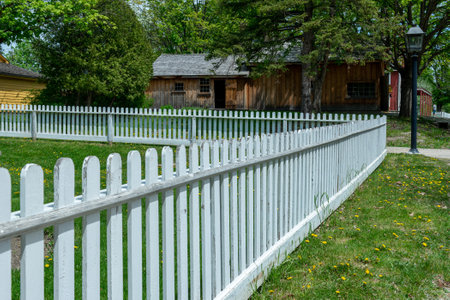 Toronto, ON, Canada â May 15, 2022: white fence in  the open-air heritage museum Black Creek Pioneer Village in Toronto, Ontario, Canadaのeditorial素材