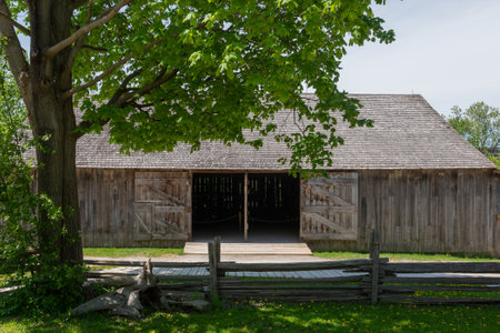 Toronto, ON, Canada â May 15, 2022: View the over forty 19th-century buildings in the open-air heritage museum Black Creek Pioneer Village in Toronto, Ontario, Canada. The village is a recreation of life in 19th-century Ontario and gives an idea of how のeditorial素材