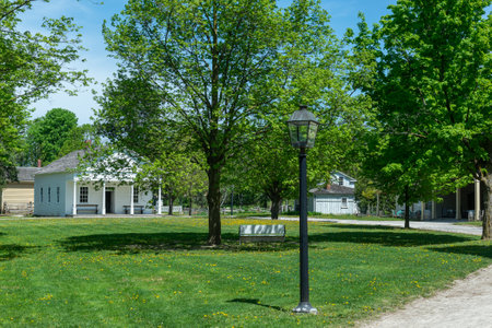 Toronto, ON, Canada â May 15, 2022: View the over forty 19th-century buildings in the open-air heritage museum Black Creek Pioneer Village in Toronto, Ontario, Canada. The village is a recreation of life in 19th-century Ontario and gives an idea of how のeditorial素材