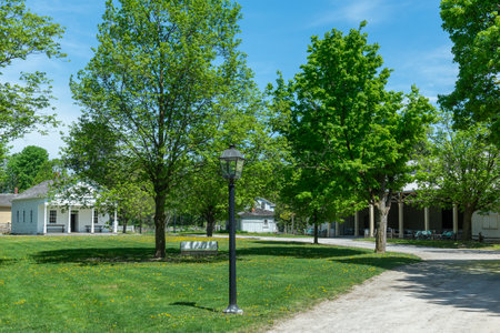 Toronto, ON, Canada â May 15, 2022: View at the street in the open-air heritage museum Black Creek Pioneer Village in Toronto, Ontario, Canada. The village is a recreation of life in 19th-century Ontario and gives an idea of how rural Ontario might haveのeditorial素材