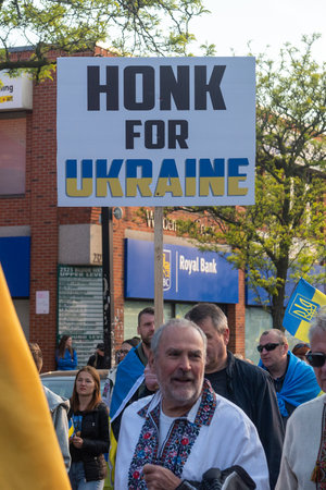 Toronto, ON, Canada â May 18, 2023:  People in Ukrainian national clothes - Vyshivanka are walking along Toronto Street on Vyshyvanka Day, which is celebrated by all Ukrainians around the worldのeditorial素材