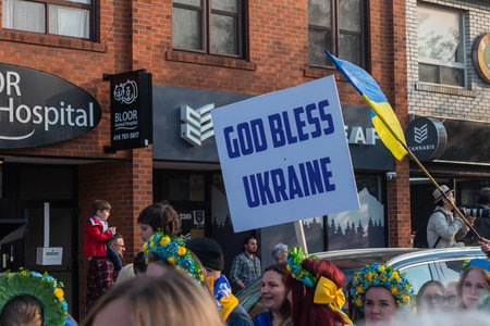 Toronto, ON, Canada â€“ May 18, 2023:  People in Ukrainian national clothes - Vyshivanka are...