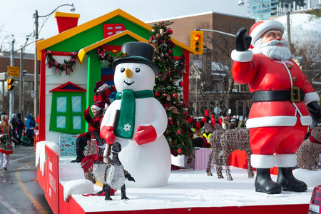 Toronto, ON, Canada â€“ November 20, 2022: People take part in the 118th Toronto Santa Claus...