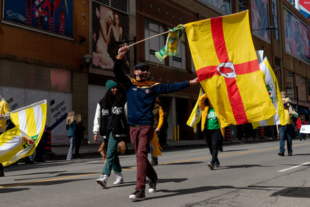 Toronto, ON, Canada â March 20, 2022: People Take Part in the St Patrick's Day Parade in Downtown Toronto Saint Patrick's Day is a Religious Holiday Celebrated Internationally on 17 March It is Named After Saint Patrick the Most Commonly Recognised of tのeditorial素材