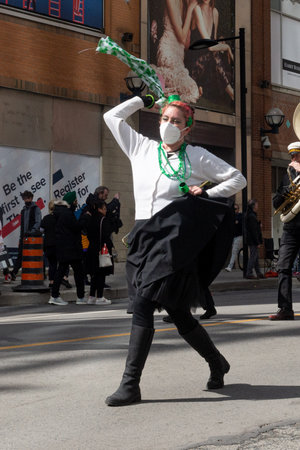 Toronto, ON, Canada â March 20, 2022: People Take Part in the St Patrick's Day Parade in Downtown Toronto Saint Patrick's Day is a Religious Holiday Celebrated Internationally on 17 March It is Named After Saint Patrick the Most Commonly Recognised of tのeditorial素材