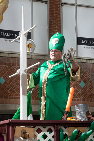Toronto, ON, Canada â March 20, 2022: People Take Part in the St Patrick's Day Parade in Downtown Toronto Saint Patrick's Day is a Religious Holiday Celebrated Internationally on 17 March It is Named After Saint Patrick the Most Commonly Recognised of tのeditorial素材