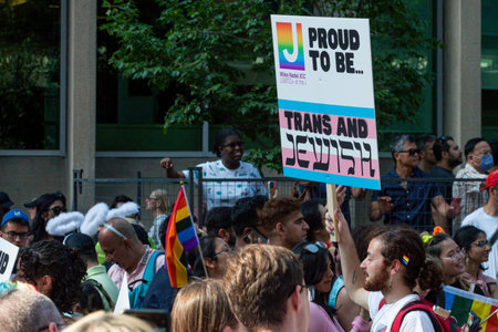 Toronto, ON, Canada â€“ June 26, 2022: Participants hold the banners during the 2022 Annual...