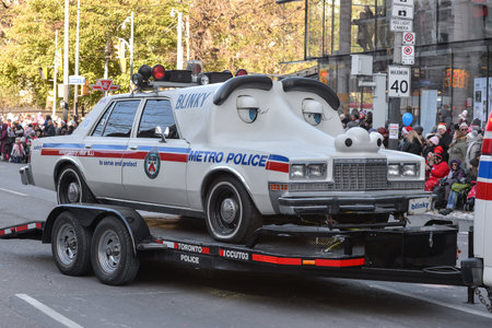 Toronto, ON, Canada â November 17, 2019: Retro police car during the Toronto Santa Claus Parade in Downtownのeditorial素材