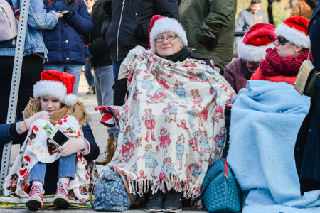 Toronto, ON, Canada â November 17, 2019: Peoples have a sit and wait the start  of the Toronto Santa Claus Parade in Downtownのeditorial素材