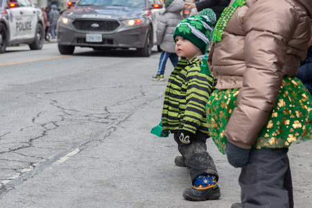 Toronto, ON, Canada â March 19, 2023: People Take Part in the St Patrick's Day Parade in Downtown Toronto Saint Patrick's Day is a Religious Holiday Celebrated Internationally on 17 Marchのeditorial素材