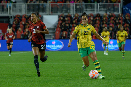 Toronto, ON, Canada - September 26, 2023: Kayla McKenna  #22 of the Jamaica national football team moves with the ball during the 2023 Concacaf W Olympic Play-In match between women national team of Canada and  Jamaica (Score 2:1)のeditorial素材