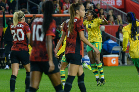 Toronto, ON, Canada - September 26, 2023:  Jamaica national football team players celebrate the scored goal during the 2023 Concacaf W Olympic Play-In match between women national team of Canada and  Jamaica (Score 2:1)のeditorial素材
