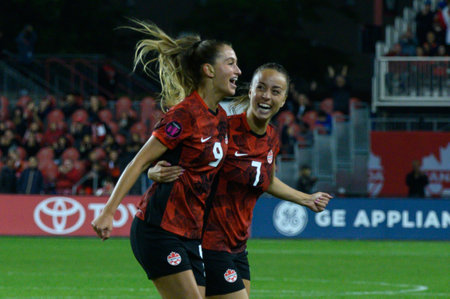 Toronto, ON, Canada - September 26, 2023: Players of Canadian National Women team selebrate the goal during the 2023 Concacaf W Olympic Play-In match between women national team of Canada and  Jamaica (Score 2:1)のeditorial素材