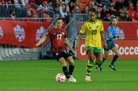 Toronto, ON, Canada - September 26, 2023: Jessie Fleming #17of the Canadian national football team moves with the ball during the 2023 Concacaf W Olympic Play-In match between women national team of Canada and  Jamaica (Score 2:1)のeditorial素材