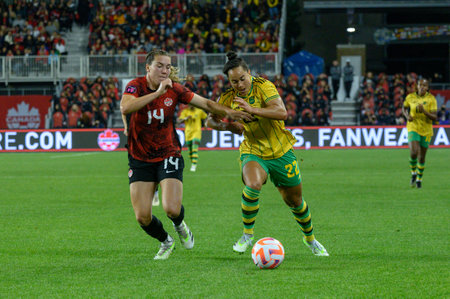Toronto, ON, Canada - September 26, 2023: Kayla McKenna  #22 of the Jamaica national football team moves with the ball during the 2023 Concacaf W Olympic Play-In match between women national team of Canada and  Jamaica (Score 2:1)のeditorial素材