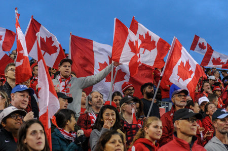 Toronto, ON, Canada - September 26, 2023: Ð¡anadian fans and supporters during the 2023 Concacaf W Olympic Play-In match between women national team of Canada and  Jamaica (Score 2:1)のeditorial素材