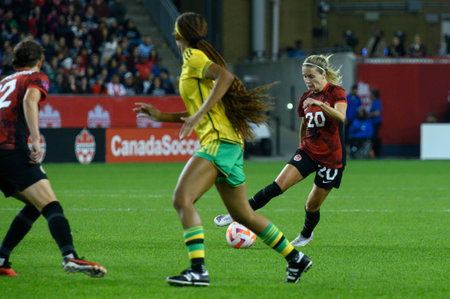 Toronto, ON, Canada - September 26, 2023: CloÃ© Lacasse #20 of the Canadian national football team moves with the ball the 2023 Concacaf W Olympic Play-In match between women national team of Canada and  Jamaica (Score 2:1)のeditorial素材