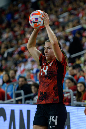 Toronto, ON, Canada - September 26, 2023: Vanessa Gilles #14 of the Canadian national football team throws the ball into during the 2023 Concacaf W Olympic Play-In match between women national team of Canada and  Jamaica (Score 2:1)のeditorial素材