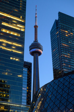 Toronto, ON, Canada - February 24, 2024: CN Tower is illuminated in the blue and yellow colours of Ukraine's flag, as solidarity is shown with the country, ahead of the anniversary of Russia's invasion of Ukraineのeditorial素材