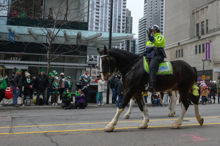 Toronto, ON, Canada - March 17, 2024: Mounted police patrol the streets of Torontoのeditorial素材