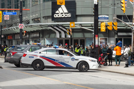 Toronto, ON, Canada - September 4, 2023: A police car patrols the streets of Torontoのeditorial素材