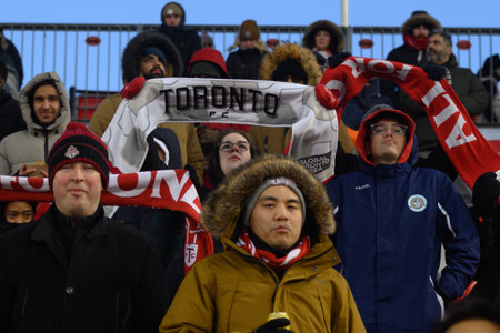 Toronto, ON, Canada -March 23, 2024:    FC Toronto Fans keep their scarfs during the MLS Regular Season match between Toronto FC (Canada) and  Atlanta United (USA) at BMO Field (Score 2:0)のeditorial素材