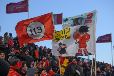Toronto, ON, Canada -March 23, 2024:    FC Toronto Fans with the flags during the MLS Regular Season match between Toronto FC (Canada) and  Atlanta United (USA) at BMO Field (Score 2:0)のeditorial素材