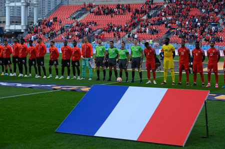 Toronto, ON, Canada - June 27, 2023: Canada team players stand for the national anthem before the 2023 Concacaf Gold Cup match between national team of Canada and Guadeloupe (Score 2:2)のeditorial素材