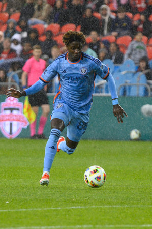 Toronto, ON, Canada - May 11, 2024: Malachi Jones #88 forward of New York City FC moves with the...