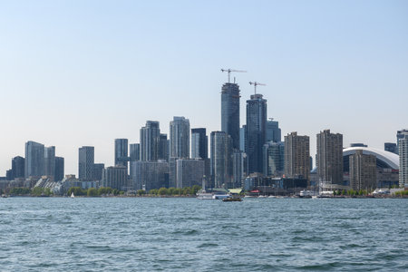 Toronto, ON, Canada - June 4, 2024: View of Downtown Toronto from the Toronto Islands during Day timeのeditorial素材